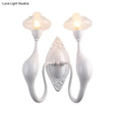 DecorBites™ Modern White LED Wall Sconce Light Fixture - Oval Glass, Dolphin-Shaped Arm