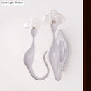 DecorBites™ Modern White LED Wall Sconce Light Fixture - Oval Glass, Dolphin-Shaped Arm