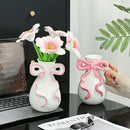 Modern white ceramic vase with pink cute bow living room decor