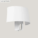 Modern white fabric sconce – bedroom wall lighting idea