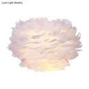 DecorBites™ Modern Feather Wall Lamp: Stylish Ambient Lighting for Living Room & Bedroom Decor
