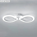 Modern white interlocking ring led wall light fixture bedroom simple design