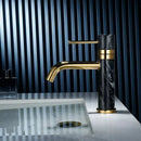 Modern white marble and brushed gold bathroom faucet with swivel spout