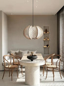 Modern white marble dining table with wood base for dining room