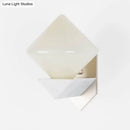 Modern white marble triangle wall sconce with glass shade bedroom light