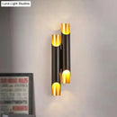 Modern white metal fixture wall sconce with gold accents living room