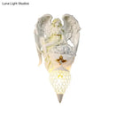 Modern white resin angel wall light with crystal shade bedroom