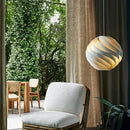 Modern white swirling spherical pendant light for dining room