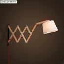 Modern wood accordion sconce with white fabric shade bedroom light