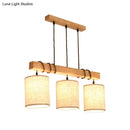 Modern wood and beige fabric island lighting fixture dining room
