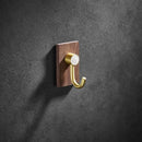 Modern wood and brushed gold wall hook row for kitchen