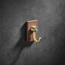 Modern wood and brushed gold wall hook row for kitchen