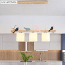 Modern wood branch bird pendant light kitchen island frosted glass