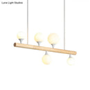 Modern wood island lamp with five globe lights dining room