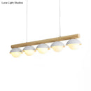 Modern wood stem linear chandelier with white shade dining room light