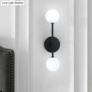 Modernist black & gold wall sconce living room double globe light