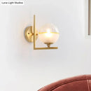 Modernist brass and frosted glass light fixture bedroom wall sconce
