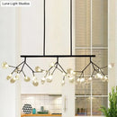 Modernist clear glass firefly hanging island light black & gold dining
