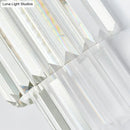 Modernist gold and clear crystal cylinder wall lighting living room