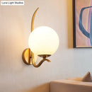 Modernist gold and white glass sconce light for bedroom