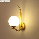 Modernist gold and white glass sconce light for bedroom