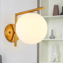 Modernist gold and white globe sconce light – bedroom wall lamp