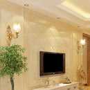 Modernist gold wall sconce with glass shade living room light
