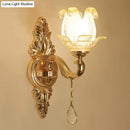 Modernist gold wall sconce with glass shade living room light