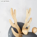 Modernist green and wood antler cylinder shape sconce bedroom light
