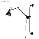 Modernist style black & white adjustable wall light dining room