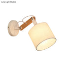 Modernist wood and fabric wall lamp – bedroom adjustable wood arm