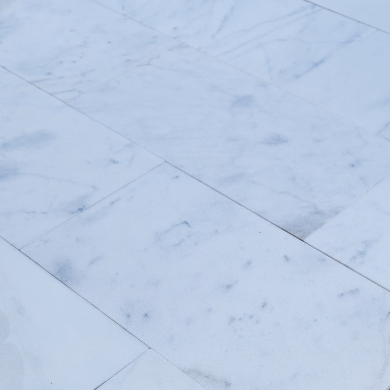 mugla white stone marble polished 12x24 angle closeup view