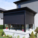 Outdoor patio with a retractable black screen covering the area