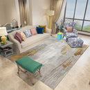 Mutad Area Rug