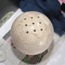 Natural beige travertine sphere incense burner living room decor