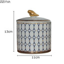 Navy and white geometric storage jar with gold plated bird bedroom decor