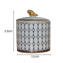 Navy and white geometric storage jar with gold plated bird bedroom decor