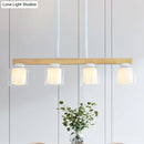 Nordic wooden linear pendant with glass shades for dining room