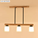 Nordic wooden linear pendant with glass shades for dining room