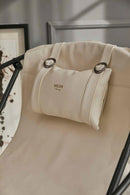 off white foldable metal frame faux leather chair black frame closeup view