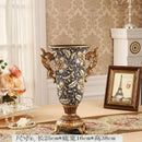 Ornate black & gold resin vase dried flowers – living room decor