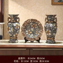 Ornate black & gold resin vase dried flowers – living room decor
