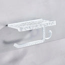 Ornate black metal toilet paper holder with phone shelf bathroom storage