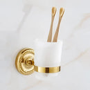 Ornate brass gold bathroom hardware set with towel rack and hooks