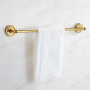 Ornate brass gold bathroom hardware set with towel rack and hooks