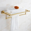 Ornate brass gold bathroom hardware set with towel rack and hooks