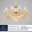 Ornate gold crystal dining room chandelier with green accent stone