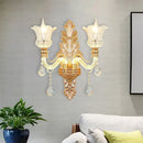 Ornate gold floral wall lamp with clear crystal glass bedroom sconce