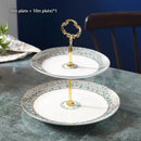 Ornate gold three tiered floral fruit plates set dining room stand