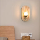 Oval led wooden wall lamp warm amber sconce for bedroom